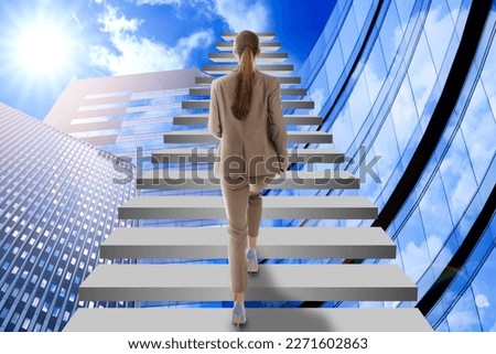 Steps to success. Businesswoman climbing up stairs among buildings Royalty-Free Stock Photo #2271602863