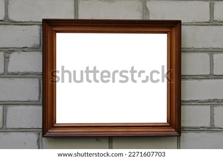 Decorative frame for a picture or photo on a brick wall