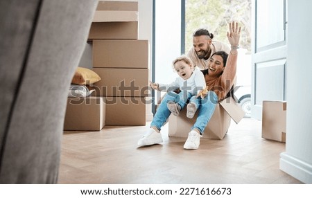 Happy family play in cardboard box for new house, moving and real estate celebration, investment and excited game. Mom, dad and kid or child play in boxes while moving into property home together Royalty-Free Stock Photo #2271616673
