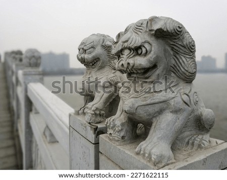 Stone lions on the bridge