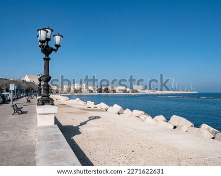 Waterfront of Lungomare Imperatore Augusto street in Bari, Italy with a black streetlamp Royalty-Free Stock Photo #2271622631