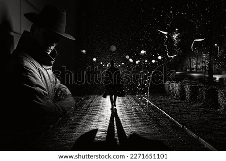 man spy agent detective in raincoat and hat in night city with rain in style of film noir. Collage with dark male silhouettes Royalty-Free Stock Photo #2271651101