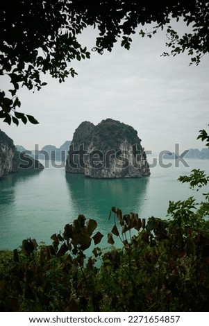 A limestone island at Ti Top Island in Ha Long Bay Vietnam Royalty-Free Stock Photo #2271654857