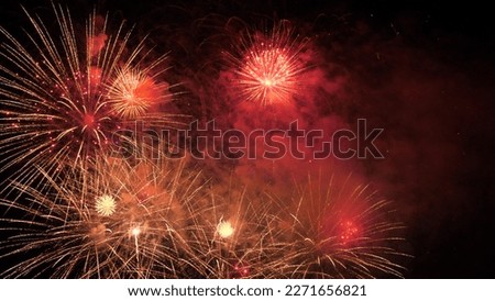 fireworks background. festive fireworks sky. new year, independence day, christmas, birthday. explosion colored lights. fiery flame sky. happy holiday. traditional holiday festival. fire spark effect.