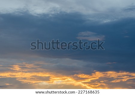 At sunset sky background