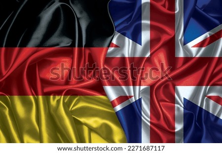 Germany and United Kingdom two folded silk flag together.