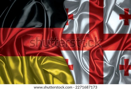 Germany and Georgia two folded silk flag together