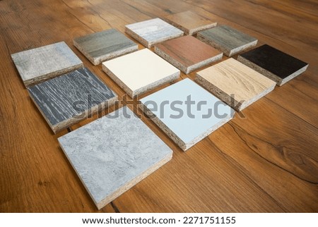 Samples of finishing materials for the manufacture of furniture, MDF facades. Medium density fiberboard Royalty-Free Stock Photo #2271751155