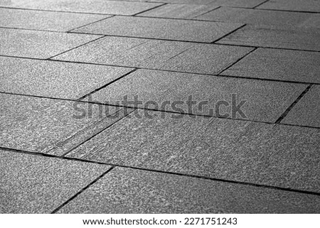 Abstract background of old pavement. Stone pavement in perspective.