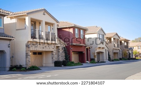 Row of multicolored townhomes in Northern California Royalty-Free Stock Photo #2271804107