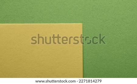 colored green and yellow paper texture for banner background