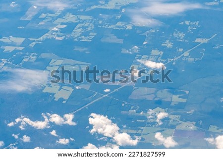  An aerial view of clouds over the farms of eastern Texas near Houston