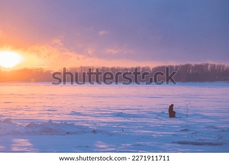 Frozen Volga river on the winter sunset. Russia, Samara city. Royalty-Free Stock Photo #2271911711