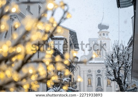 Under a dense snowfall in the streets of San Candido. Val Pusteria Royalty-Free Stock Photo #2271933893