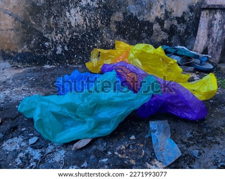Full color Trash plastic bag with grunge and dirty wall for background