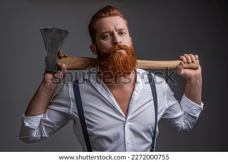 masculinity of bearded man with axe in studio. masculinity of man with axe Royalty-Free Stock Photo #2272000755
