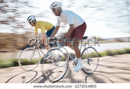 Cycling, speed and men on bicycle with motion blur for adrenaline, extreme sports and action on road. Fitness, mountain biking and friends on bikes for exercise, workout and training for competition Royalty-Free Stock Photo #2272016803