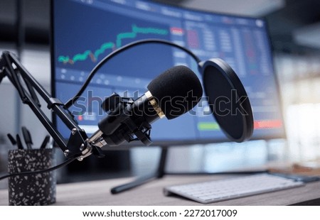 Microphone, studio and computer screen for podcast, radio or audio news on stock market update background. Mic, sound technology and pc monitor for broadcast, trading review and algorithm statistics