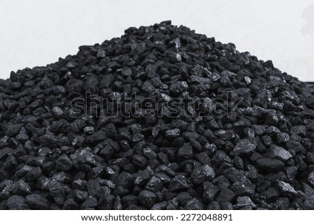 Pile of natural black hard coal for texture background. Coal energy.
