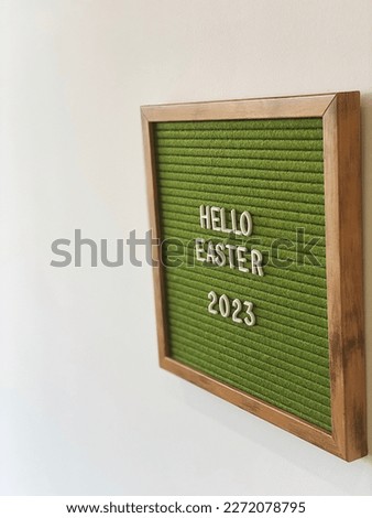Hello Easter 2023 flatlay. Letters Hello Easter. Rustic Easter 2023