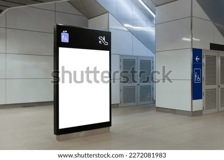 Blank mock up for vertical poster advertising; 6 sheet digital display in MRT station; OOH out of home template. Royalty-Free Stock Photo #2272081983