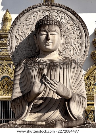Buddha is a title given to the founder of Buddhism, Siddhartha Gautama, who lived in ancient India in the 6th century BCE. The word "Buddha" means "enlightened one" or "awakened one," and it refers to Royalty-Free Stock Photo #2272084497