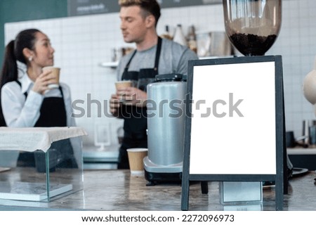 close up white space on board, mockup empty for text ads or price on counter at cafe Have employees in background. empty for information banner.