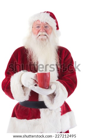 Santa holds a red cup on white background