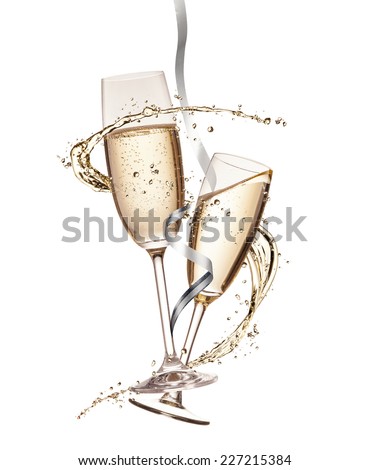 Two glasses of champagne with splash, isolated on white background Royalty-Free Stock Photo #227215384