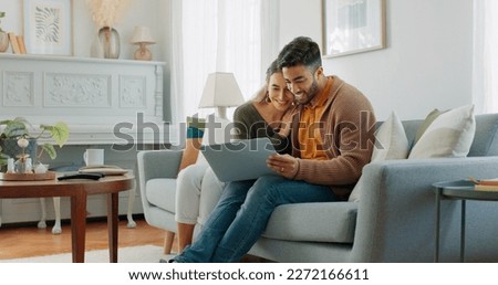 Laptop, living room and couple search website information for home investment, loan or real estate property discussion on sofa. Young people on couch with pc internet, planning future together Royalty-Free Stock Photo #2272166611