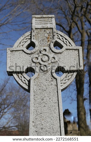 One stone cross with the Celtic circle.