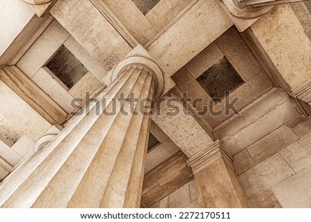 Antique stone column of a old building close-up. Royalty-Free Stock Photo #2272170511