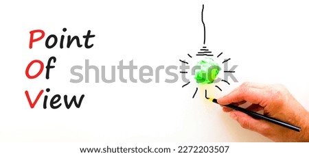 POV point of view symbol. Concept words POV point of view on white paper on a beautiful white background. Green light bulb icon. Businessman hand. Business and POV point of view concept. Copy space.