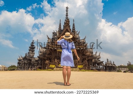 Woman traveler at  Sanctuary of Truth in Pattaya in a summer day Royalty-Free Stock Photo #2272225369