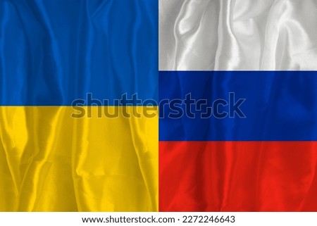 Flag of Ukraine and flag of Russia. Flag of the country of Ukraine and Russia together. Conceptual image of Ukraine and Russian aggression