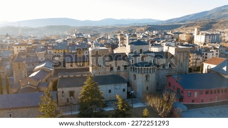Aerial view of Spanish city of la Seu d'Urgell with Romanesque Cathedral of Santa Maria in autumn day Royalty-Free Stock Photo #2272251293