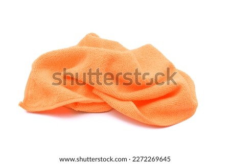 Crumpled microfiber cleaning cloth, isolated on white background, closeup