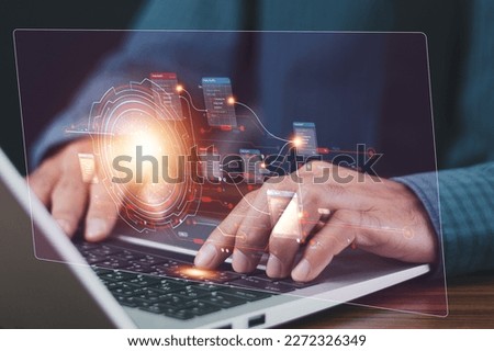 Businessman using computer Software for security, searching and managing corporate files, Corporate data management system and document management system with employee privacy. Royalty-Free Stock Photo #2272326349