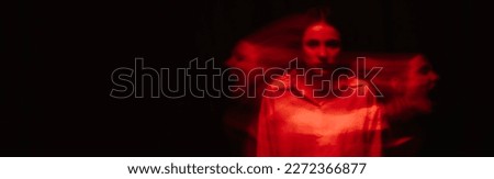 blurry portrait of a psychopathic girl with mental paranoid disorders. Panoramic wide horizontal photo for banner head cover