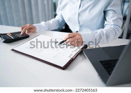 Asian Woman working by using a laptop computer Hands typing on keyboard. Working at office professional investor working new start up project