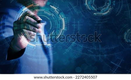 Abstract Businessman Holding Pen HUD Circle User Interface on Black Background Find Target and Scan Hologram Elements Theme Digital UI Virtual and Sci-fi Circle Hologram Technology Copy Space