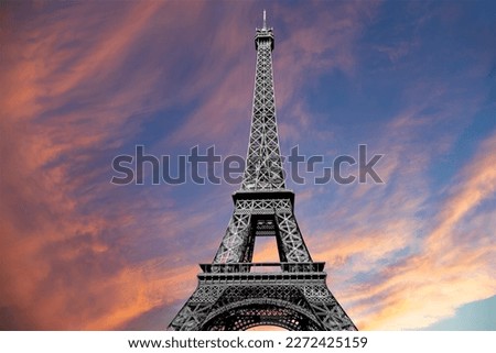  Eiffel Tower against the background of a beautiful sky at sunset. Paris, France 