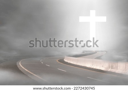 Christian Cross on the street with dramatic sky background