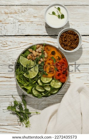 Bowl with tasty and nutritious food, top view