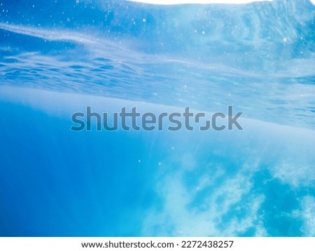 abstract underwater background of clear blue tropical sea