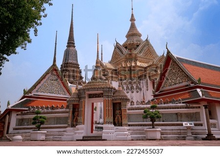 Wat Pho is a beautiful temple and has the most pagodas in Thailand Which foreign tourists are popular to visit a lot, Bangkok, Thailand. Royalty-Free Stock Photo #2272455037