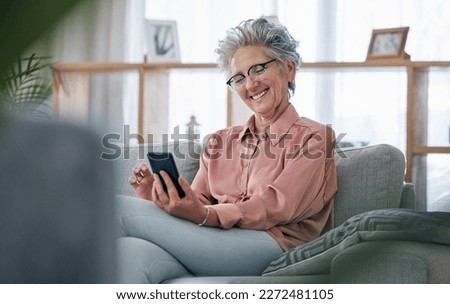 Elderly woman with smartphone, communication and relax at home, social media and happy with technology. Retirement, internet and chat online with wifi, happiness with reading ebook or news on website