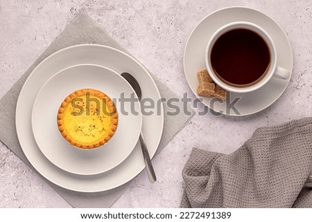 Macro food photography of tea, custard tart, sugar,  beverage, drink, breakfast
