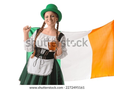 Irish waitress with beer and flag of Ireland on white background. St. Patrick's Day celebration