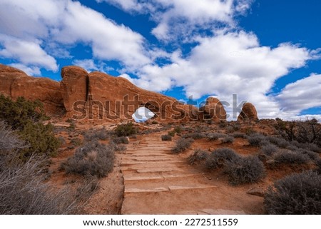 Stairs to North Window Arch on the Windows Loop Trail. Arches National Park, Utah, USA Royalty-Free Stock Photo #2272511559